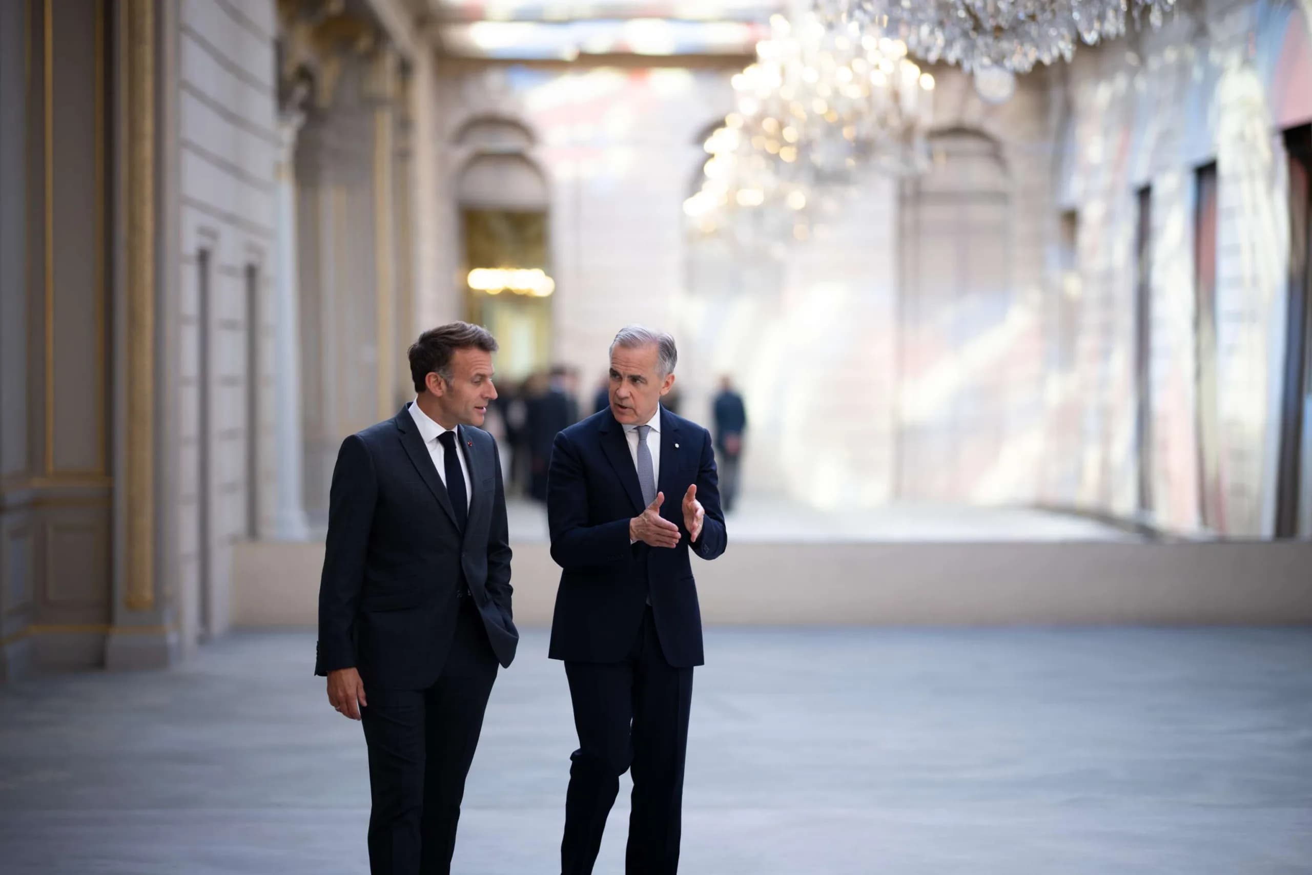 Tiny French island, big Atlantic message: Macron meets Carney